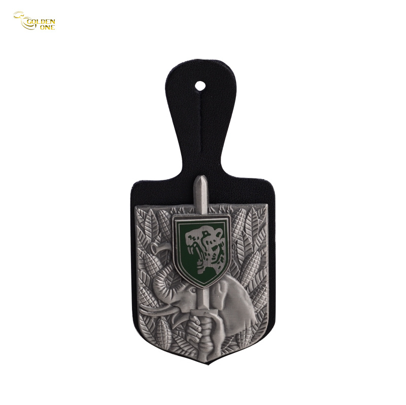 Professional Official Badge with Leather Strap (Curved Or Flat), Available in 2D Or 3D Finishes, Featuring A Safety Pin Back And OPP Pouch Packaging. Ideal for Bulk Promotions at Large-scale Ev
